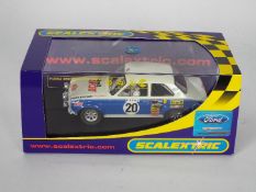 Scalextric - A boxed Scalextric C2798 Ford Escort RS1600 1:32 scale slot car.