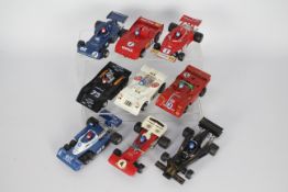 Polistil - 9 x unboxed slot cars including Tyrell 34/2 # A98, Tyrell Ford, BRM and others.
