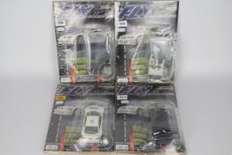 Fly Collection - A BMW 320i E46 self assembly model in a set of 4 x factory sealed carded issues.