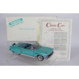 Danbury Mint - A boxed Danbury Mint 1:24 scale 1958 Chevrolet Impala.