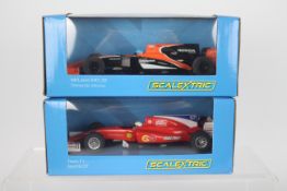 Scalextric - Two boxed Scalextric Formula 1 slot cars.