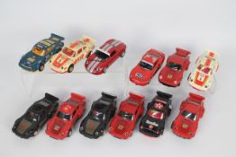 Scalextric - 12 x unboxed Porsche slot cars in 1:32 scale including ten 911 models, a 959,