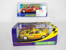 Scalextric - 2 x boxed Peugeot 307 WRC 4x4 models, # C2788, # C2885.