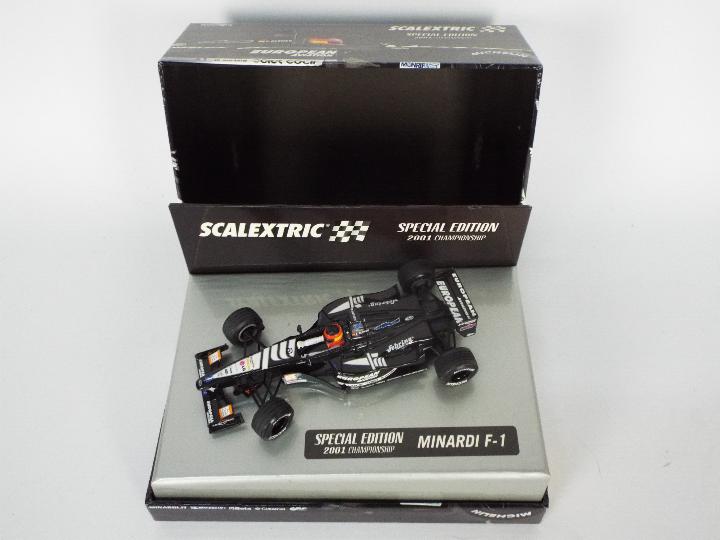 Scalextric - a boxed Minardi F1 special edition 2001 Championship car # 6194.