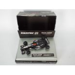 Scalextric - a boxed Minardi F1 special edition 2001 Championship car # 6194.