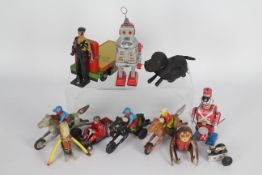 Schuco, Other - A collection of vintage, collectable, tinplate and plastic toys.