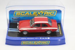 Scalextric - A boxed Scalextric C3113 Ford Escort Mk.1 Mexico 1:32 scale slot car.