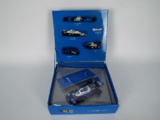 SCX - A boxed limited edition Tyrell P34 F1 car in Elf livery # 60590.