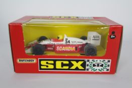 SCX - a boxed Formula Indy Lola Ford # 83470.