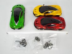 Scalextric - 3 x ex set McLaren P1 cars.