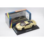 Scalextric - A boxed Jaguar XJ220 in gold with working lights # C2083.