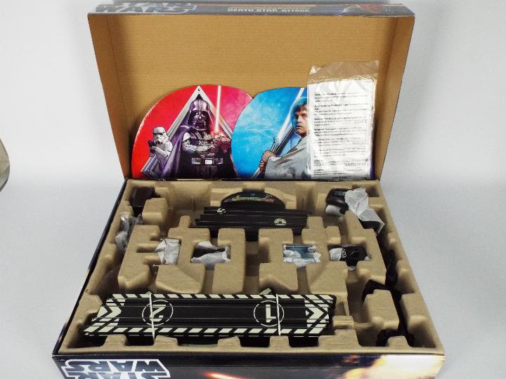 Scalextric - Star Wars - A boxed Star Wars Death Star Attack Micro Scalextric set # G1084.