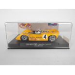 Thunderslot - A boxed McLaren M6A Can-Am car number 4 as driven by Bruce McLaren at the 1967 Laguna