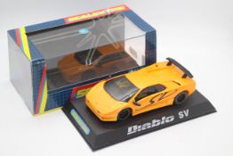 Scalextric - A boxed Lamborghini Diablo SV in orange with working lights # C2193.