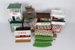 Scalextric - A collection of six predominately boxed vintage Scalextric trackside buildings /