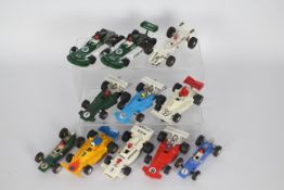 Scalextric - 11 x unboxed race cars including Europa # C5, March 771 # C129, Arrow # C23 and others.