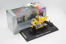 Scalextric - A boxed 2004 Moto GP Honda Pons ridden by Makoto Tamada # C6002 The model appears Mint