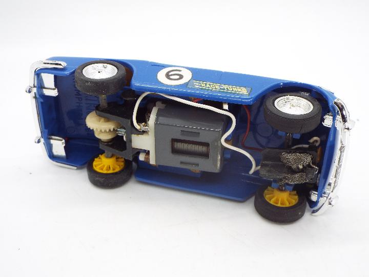Scalextric - A boxed vintage Triumph TR4A Race Tuned model in blue # C-84. - Image 4 of 5