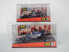 SCX - 2 x boxed Minardi F1 cars,