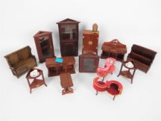 Barbour - A collection of hand made wooden dolls house furniture by Lynn & Peter Barbour.