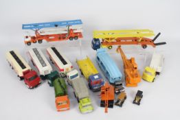 Dinky - 12 x unboxed and repainted Dinky trucks including two AEC tanker trucks,