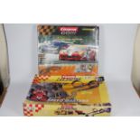 Carrera - 2 x boxed slot car racing sets,