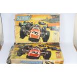 Scalextric - 2 x vintage boxed Grand Prix 75 sets in 1:32 scale.