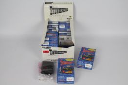 Konami - A shop box of 12 Gerry Andersons Japanese classic Thunderbirds vehicles.