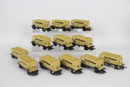 Lima - 12 x unboxed 00 gauge # 305636 50 Ton Aggregate Hopper wagons in ARC Amey Roadstone livery.