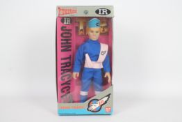 Bandai - A boxed Bandai 1992 'Thunderbirds' 'John Tracy' action figure.