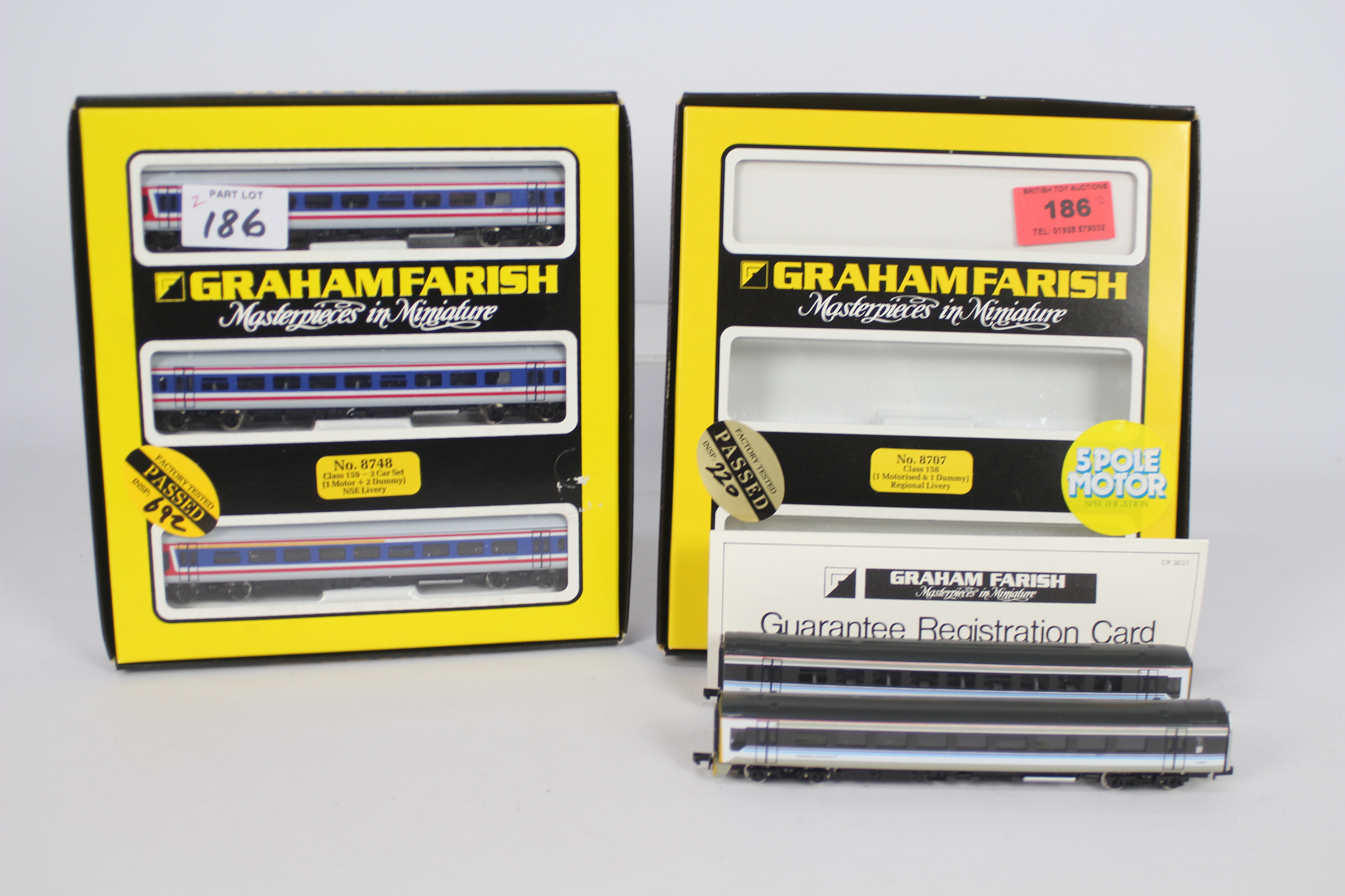 Graham Farish - two N gauge multi-car sets comprising three-car set No. 8748 and two-car set No.