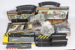 Scalextric - A collection of boxed trackside accessories and loose track pieces including # C190