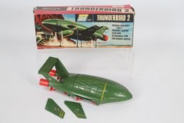 JR Rosenthal Ltd Century 21 - A boxed plastic friction powered 'Thunderbird 2' from JR Rosenthal 21