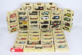 Lledo - a quantity of 50 x boxed 'Days Gone' die-cast model vehicles - Lot includes a #46001 blue 4.