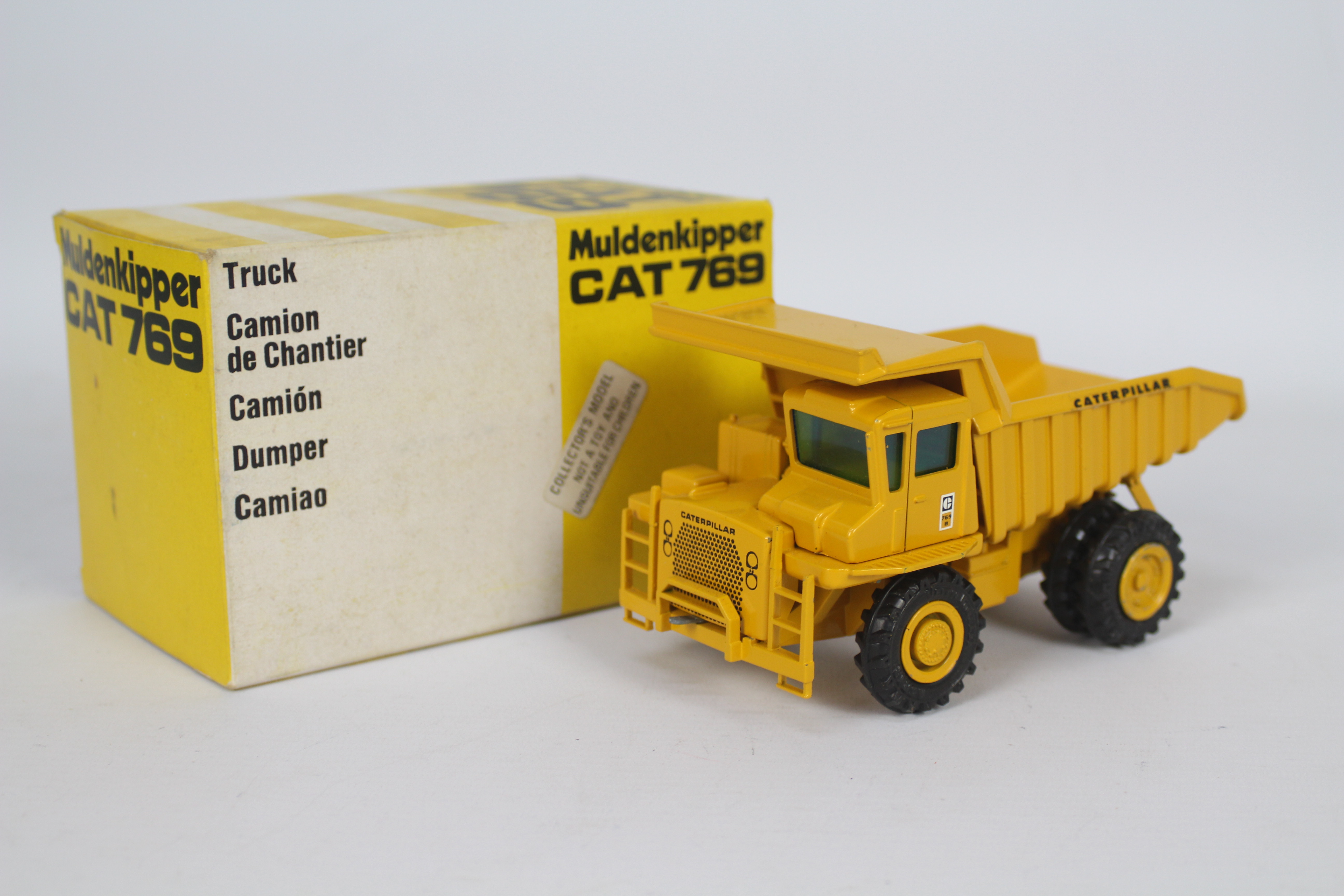 Gescha - A boxed CAT 769 Muldenkipper dumper truck in 1:50 scale. # 276.