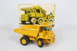 Gescha - A boxed CAT 769 Muldenkipper dumper truck in 1:50 scale. # 276.