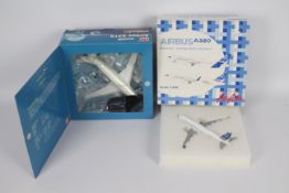 Aeroplane Models - two 1:200 scale models comprising Airbus A320 (Air Asia) & Airbus A310-304 (HM