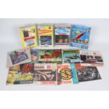 A collection of 7 x vinyl Thunderbirds records and 3 x Thunderbirds video cassette tapes - Lot