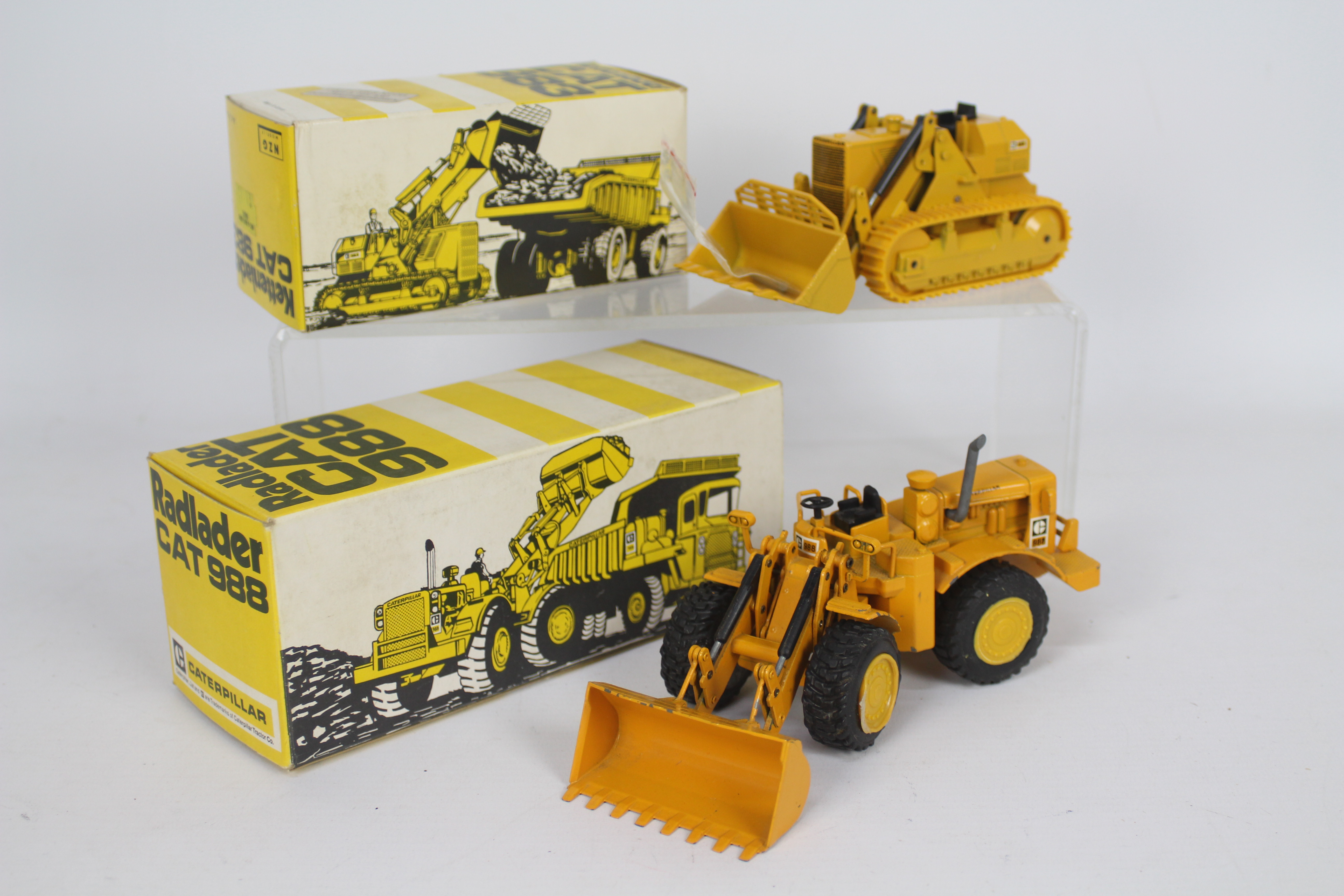 NZG - 2 x boxed CAT models,