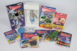 Matchbox - A selection of Gerry Anderson 1990's Thunderbird Die-cast vehicles.