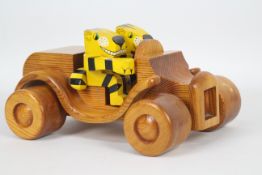 Frank Egerton - A rare hand crafted wooden sports car with two tiger figures made by the late