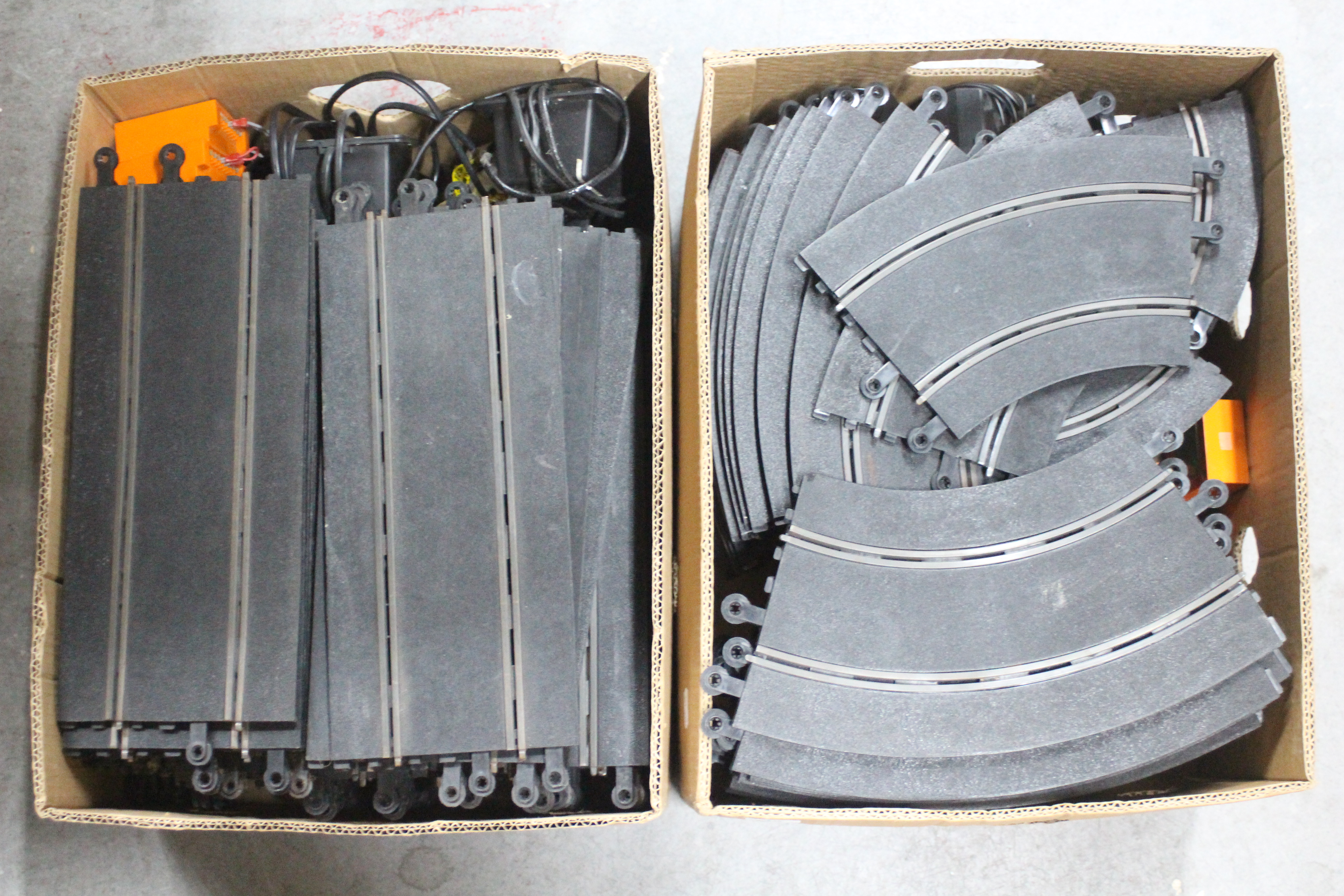 Scalextric - A large quantity of used Scalextric track, two 49 x 38 x 25 cm boxes full,