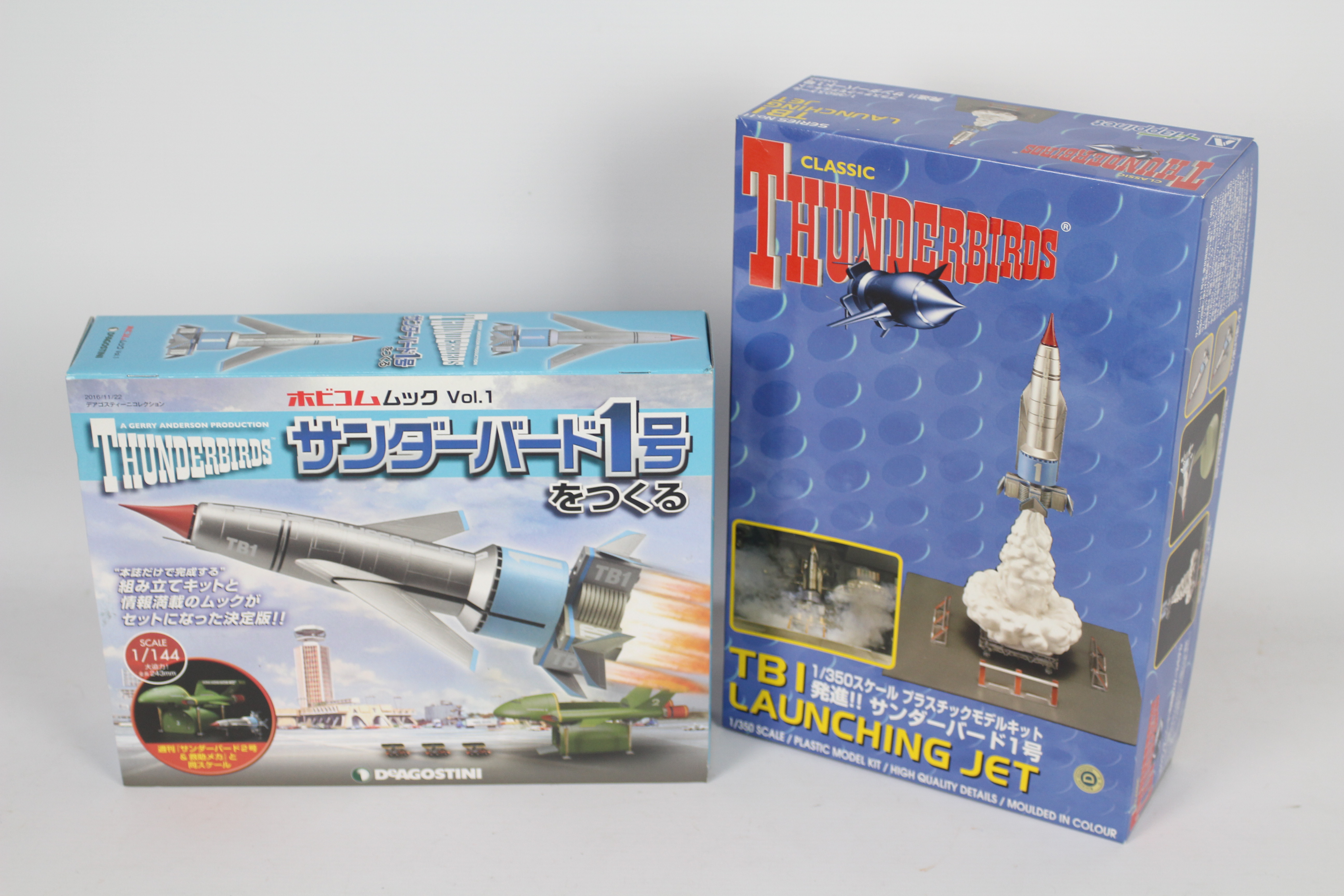 Aoshima, Deagostini - Two boxed 'Thunderbirds' plastic model kits.