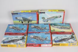 Eight model kits of military aeroplanes by Kovozavody,
