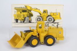 NZG - A boxed Radlader Cat 988 B Loader in 1:50 scale. # 167.