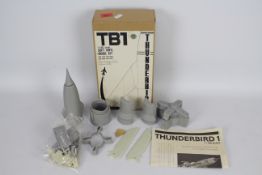 Modelkasten - A boxed 1:100 scale vinyl and resin model kit of Thunderbird 1 by Modelkasten.