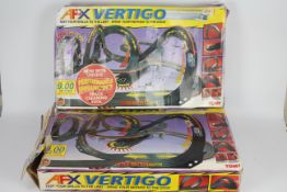 Tomy - 2 boxed sets # 8661 Tomy AFX Vert