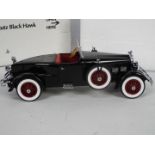 Danbury Mint - A boxed 1:24 scale 1927 Stutz Black Hawk by Danbury Mint.