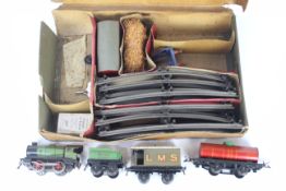 Hornby - A boxed Hornby clockwork O gauge train set in an 'Austen Reed' branded box.