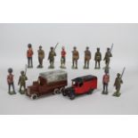 Dinky Toys, Britains - Two unboxed Dinky Toys plus a quantity of Britains metal soldiers.